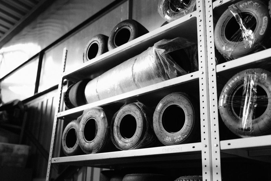 Tires organized on secure storage racks